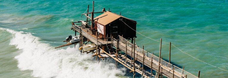 Wooden pier over turquoise water