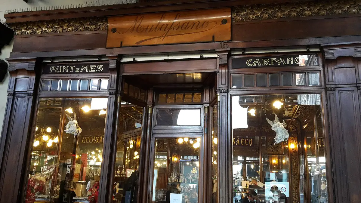 The carved wooden shopfront of Caffè Mulassano on Piazza Castello, Turin